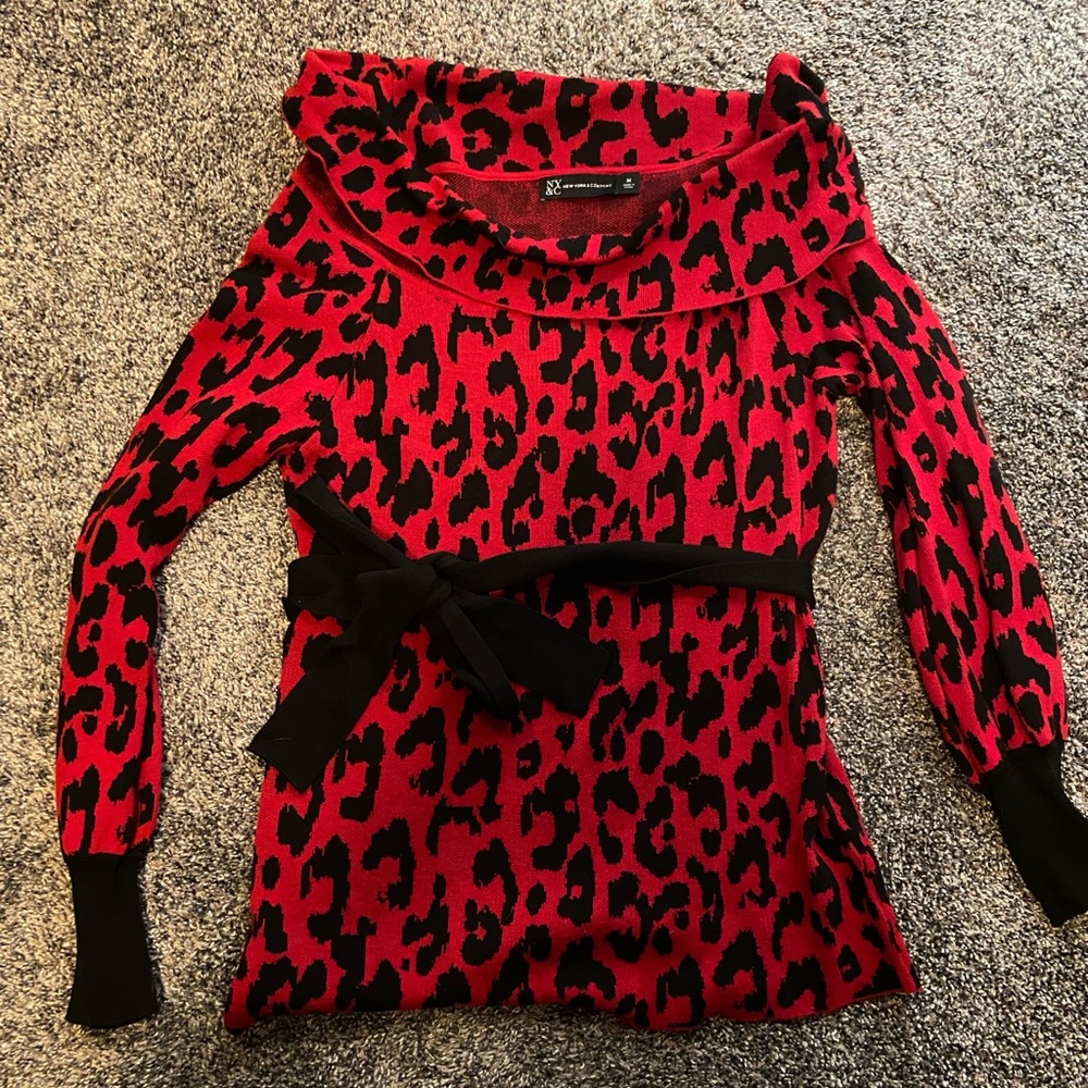 New, never worn, no tags. New York & Company Women’s sweater with tie belt